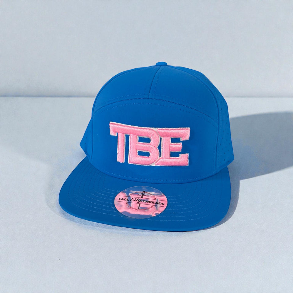 Pink on blue snapback TBE hat